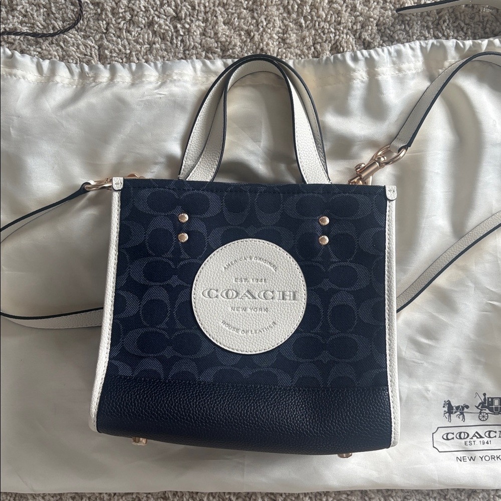 Last call- selling to resaler…NWT & papers! Coach Dark Blue Crossbody